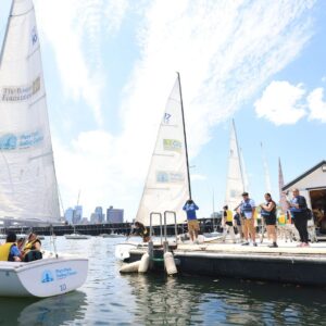 Two sailboats in the Piers Park cove